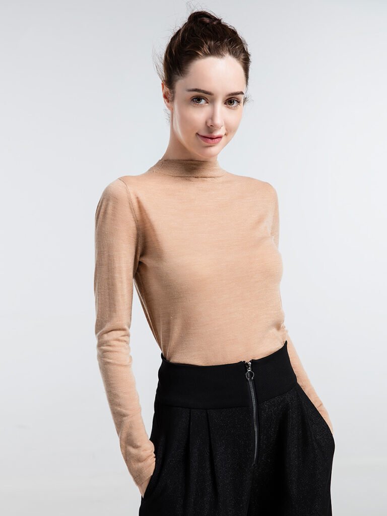 Warm and breathable wool sweater ideal for cold weather, showcasing the insulating properties of wool fibers